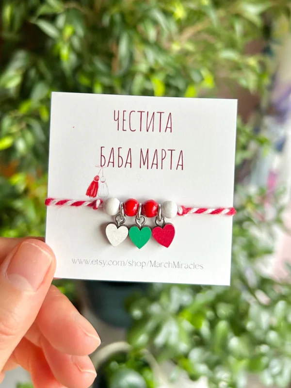 Handmade Martenitsa pendant with three wooden hearts in traditional Bulgarian colors. Perfect for Baba Marta traditions and gifting